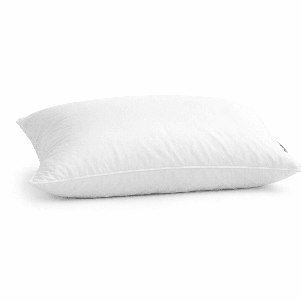 Rectangular white bed pillow with a soft, plump appearance and a small blue brand tag visible on one end