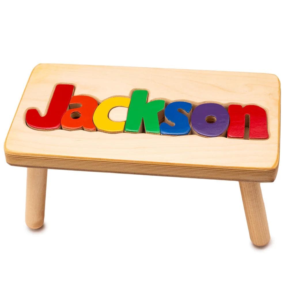 Personalized wooden name puzzle step stool with colorful letters spelling 'Jackson'