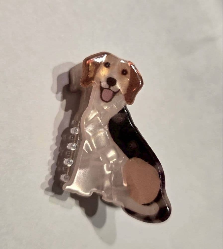 Translucent iridescent acrylic beagle dog-shaped hair claw clip with painted brown, black, and white details